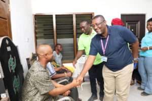 Handshake-with-the-Mepe-Traditional-Council