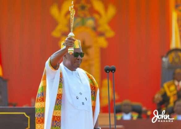 Photo of John Mahama holding the state sword